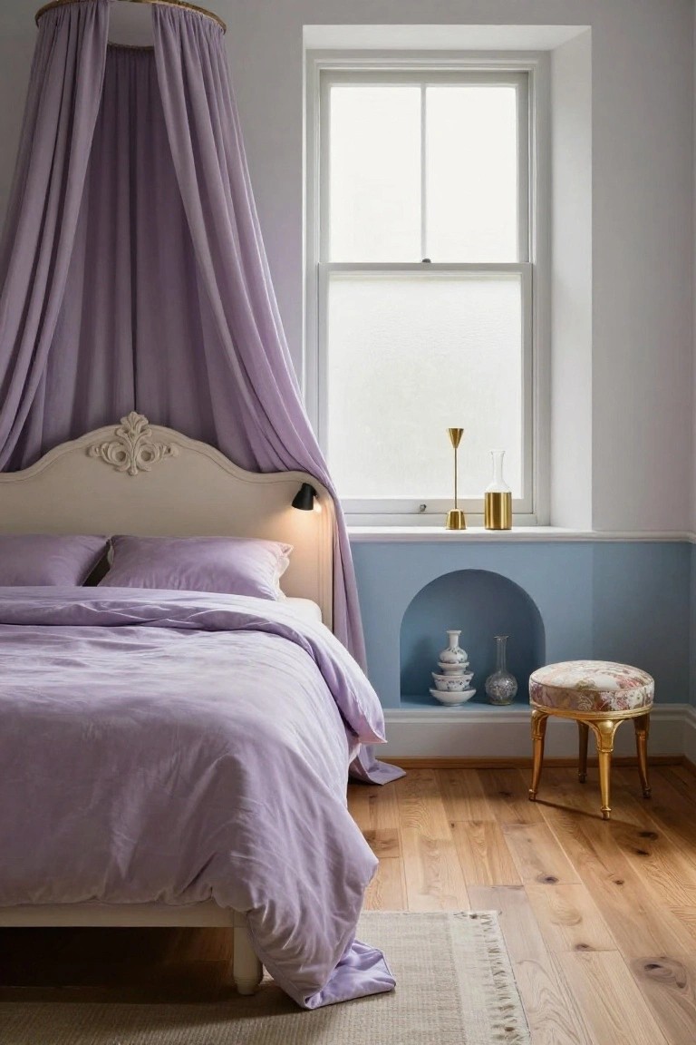 A bedroom with a white carved bed draped in purple canopy fabric, purple bedding, a blue alcove niche holding white and clear ceramics, gold candleholders near a window, a patterned stool, and light wood floors.