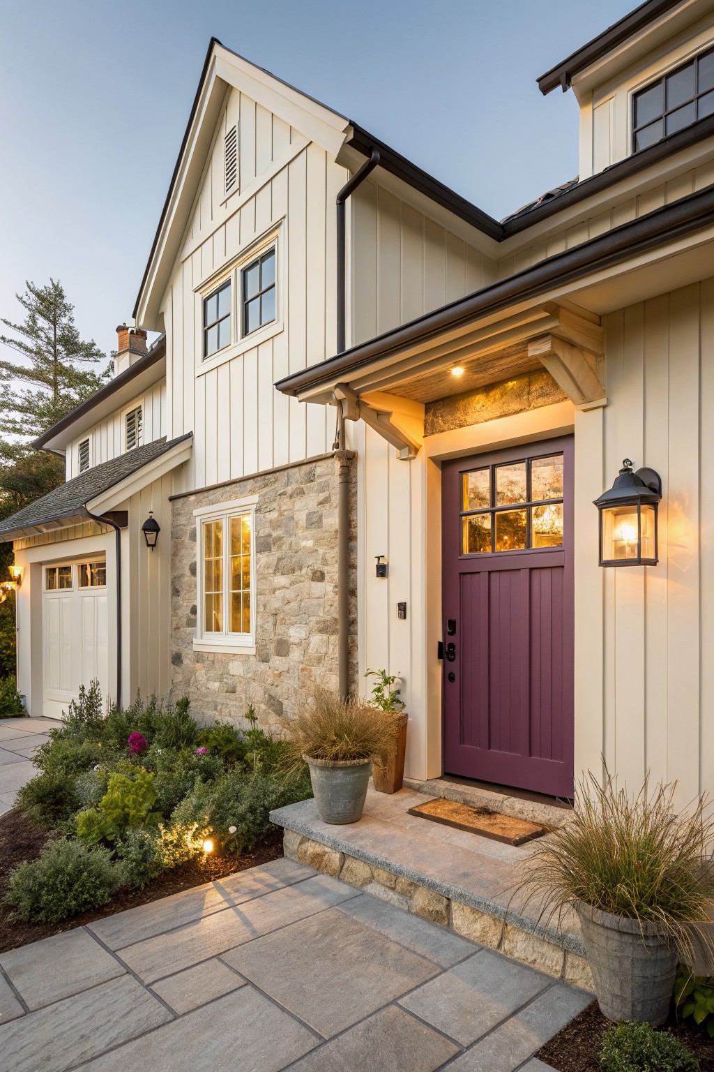 Charming house with purple door, stone steps, potted plants, and evening lights.
