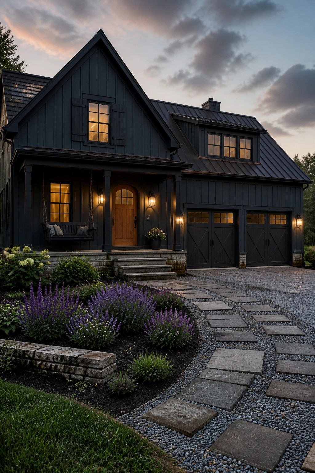 Dark charcoal siding on a modern farmhouse exterior with a gravel driveway.