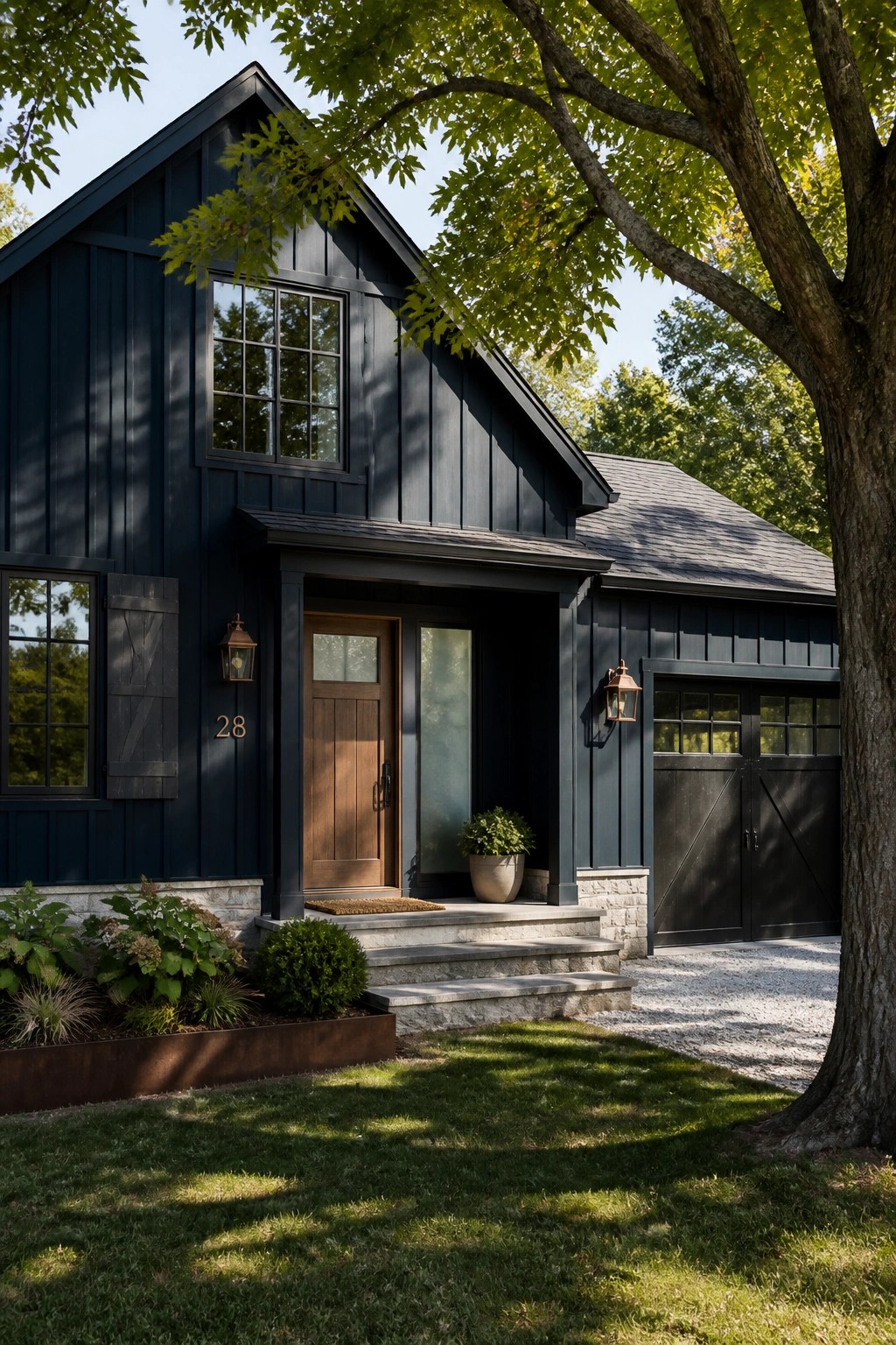 A dark navy painted house exterior with wood door and stone foundation.
