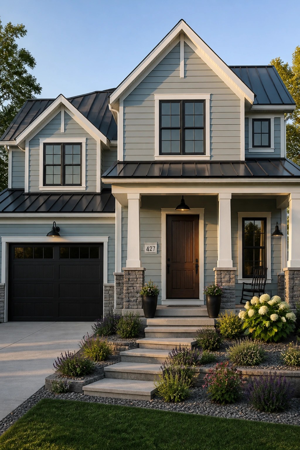 Modern farmhouse with soft blue-gray siding and white trim.