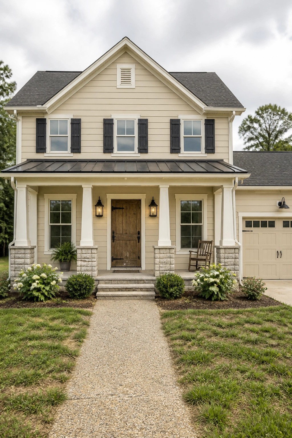 Light beige siding on a modern farmhouse with white trim and a dark roof.