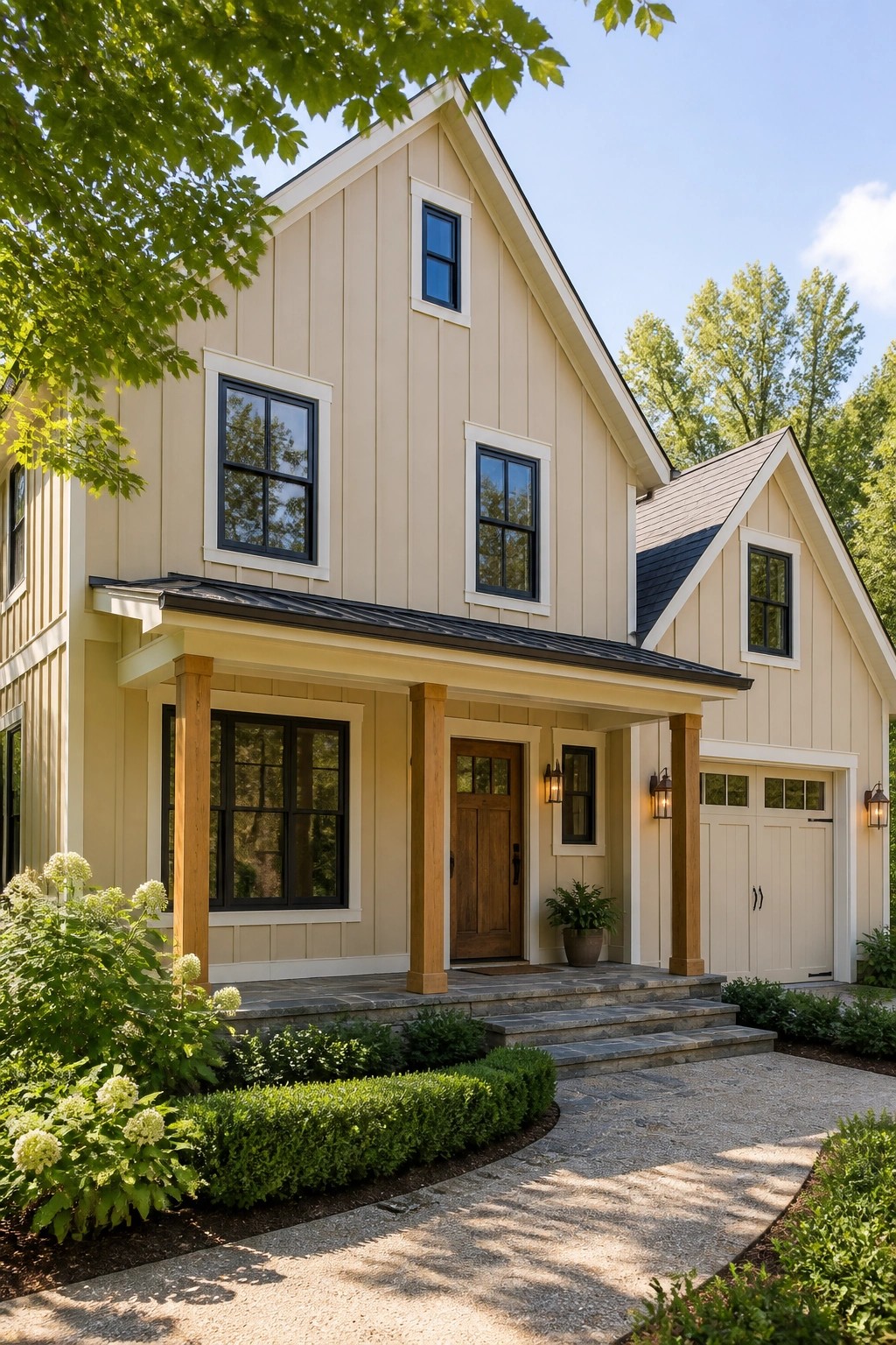 A modern farmhouse exterior painted in a soft warm beige.