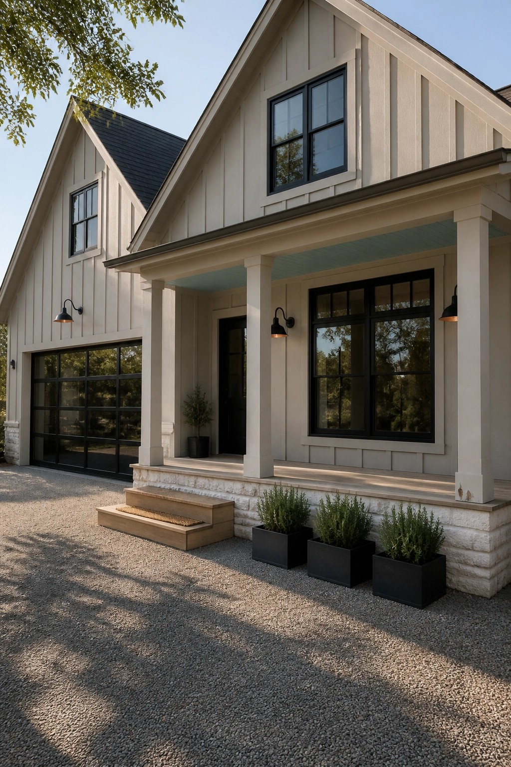 Modern farmhouse exterior with warm greige siding and black trim windows.