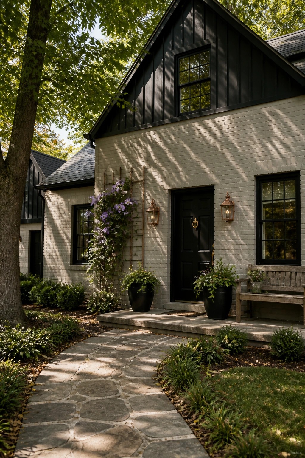 A white painted brick exterior with black trim on a modern farmhouse.