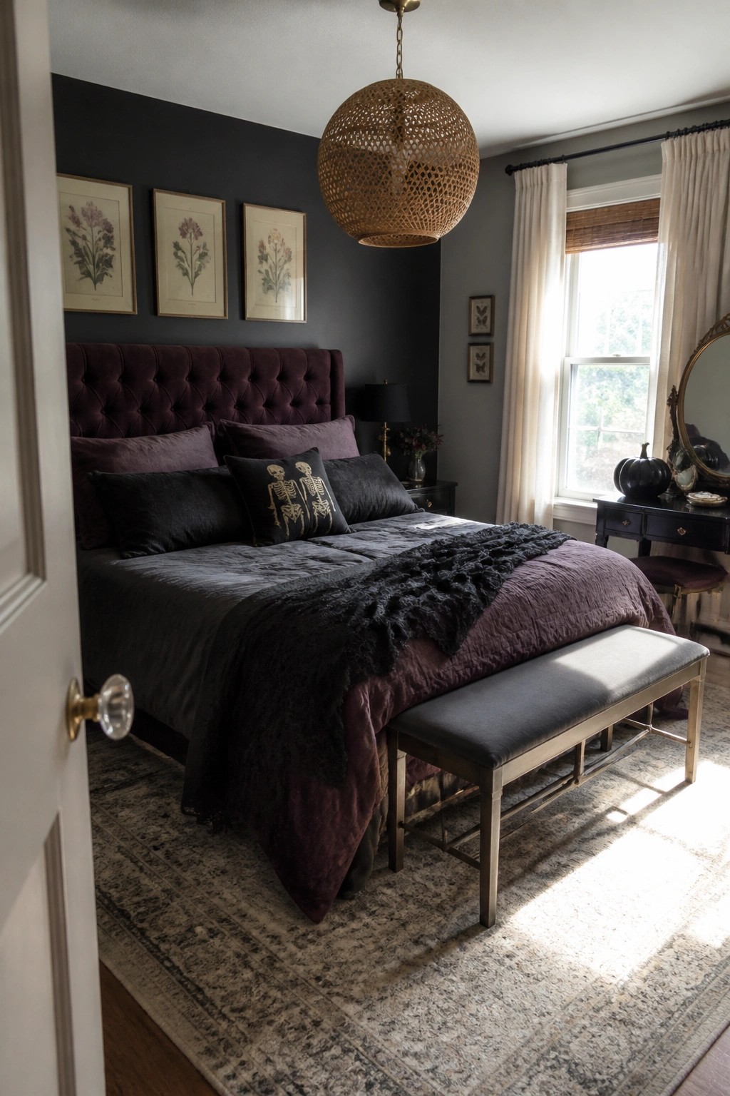 Dark bedroom with purple velvet headboard, skeleton pillow, woven pendant light, and rug.